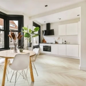Modern kitchen and dining area with natural light