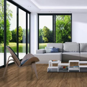 Modern living room with large windows overlooking garden