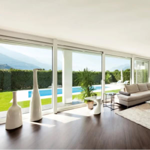Modern living room overlooking pool and mountains