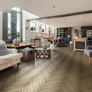 Elegant open-plan living room with kitchen area