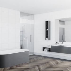 Modern bathroom with white tiles and grey bathtub