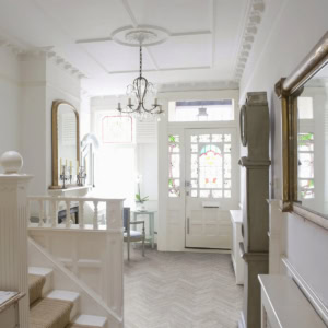 Bright vintage interior with chandelier and stained glass doors