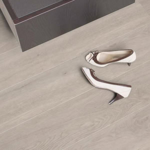 White high heels on wooden floor